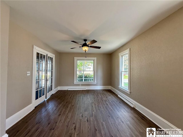 118 S 8th St, Olean-City, NY 14760 - spare room with dark wood-style flooring, baseboard heating, and ceiling fan