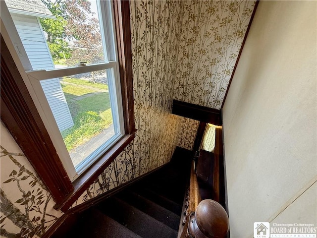 118 S 8th St, Olean-City, NY 14760 - staircase featuring wallpapered walls and plenty of natural light