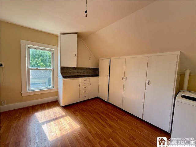 118 S 8th St, Olean-City, NY 14760 - additional living space featuring washer / clothes dryer, wood finished floors, and vaulted ceiling