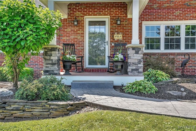 4964 Meadowbrook Rd, Clarence, NY 14221 - property entrance featuring brick siding and a porch