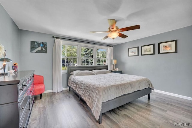 4964 Meadowbrook Rd, Clarence, NY 14221 - bedroom with wood finished floors and a ceiling fan
