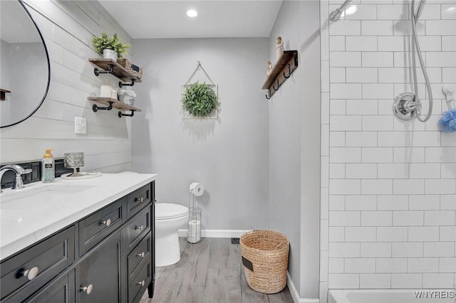4964 Meadowbrook Rd, Clarence, NY 14221 - full bath with vanity, wood finished floors, wooden walls, and recessed lighting