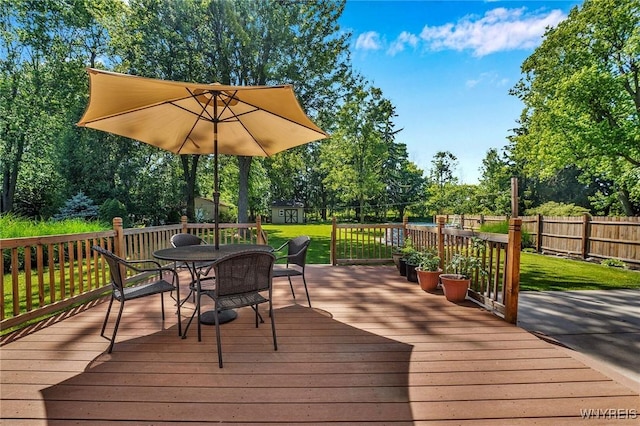 4964 Meadowbrook Rd, Clarence, NY 14221 - deck featuring outdoor dining area and view of scattered trees