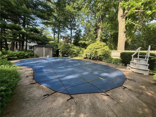 5 White Birch Cir, Chili, NY 14624 - view of pool with a storage unit and a covered pool