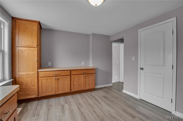 355 Fawn, West Seneca, NY 14224 - unfurnished dining area featuring light wood-type flooring and baseboards