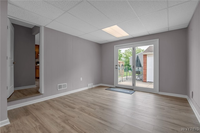 355 Fawn, West Seneca, NY 14224 - empty room with wood finished floors and a drop ceiling