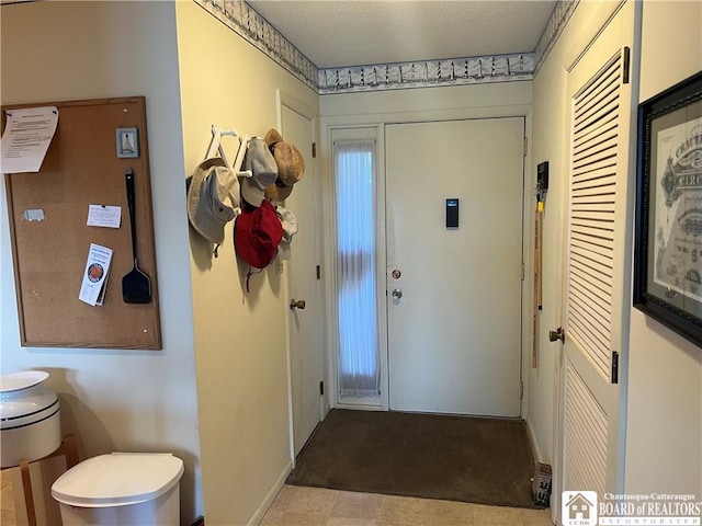 34 Oneida Dr, Chautauqua, NY 14728 - foyer entrance with baseboards and carpet