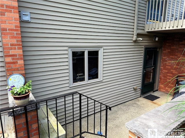 34 Oneida Dr, Chautauqua, NY 14728 - entrance to property featuring brick siding and a balcony