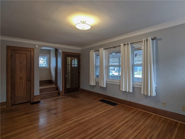 120 Whiteford Rd, Rochester, NY 14620 - spare room with arched walkways, dark wood-style flooring, and ornamental molding