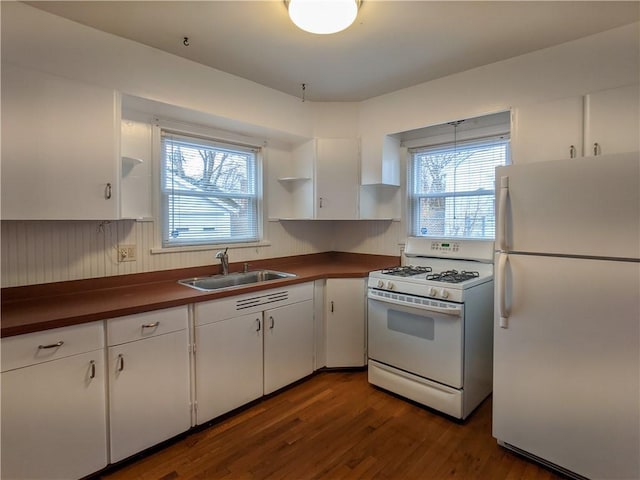 120 Whiteford Rd, Rochester, NY 14620 - kitchen featuring white appliances, dark countertops, open shelves, and white cabinetry