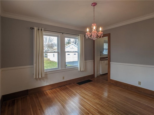 120 Whiteford Rd, Rochester, NY 14620 - unfurnished room with wood finished floors, a chandelier, and ornamental molding
