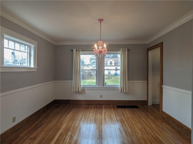 120 Whiteford Rd, Rochester, NY 14620 - unfurnished dining area featuring dark wood finished floors, a chandelier, and crown molding