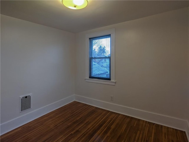 120 Whiteford Rd, Rochester, NY 14620 - spare room with baseboards and dark wood-style floors