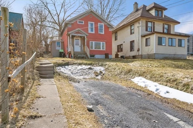 279 W Main St, German Flatts, NY 13357 - view of front facade featuring a chimney and entry steps