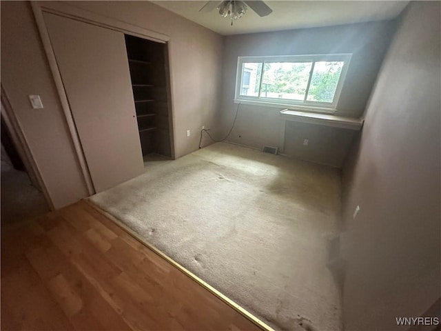 5799 Fairview Dr, Cambria, NY 14132 - unfurnished bedroom featuring wood finished floors and ceiling fan