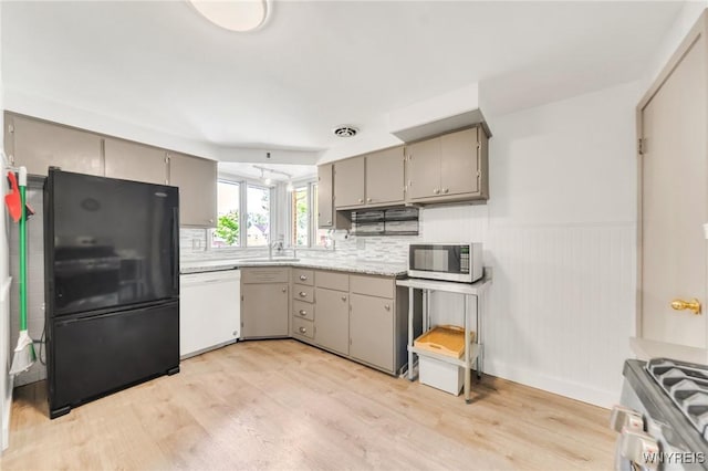 36 Lennox Ave, Amherst, NY 14226 - kitchen with freestanding refrigerator, white dishwasher, gray cabinets, stainless steel range oven, and light countertops