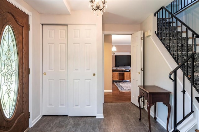 158 Pine Valley Dr, Greece, NY 14626 - foyer entrance featuring stairway and a chandelier