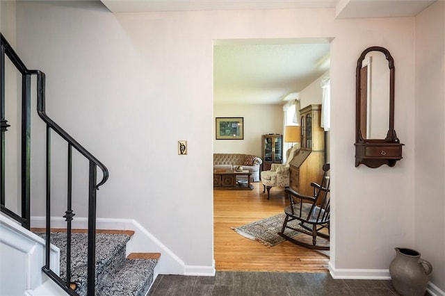 158 Pine Valley Dr, Greece, NY 14626 - stairway featuring wood finished floors and baseboards