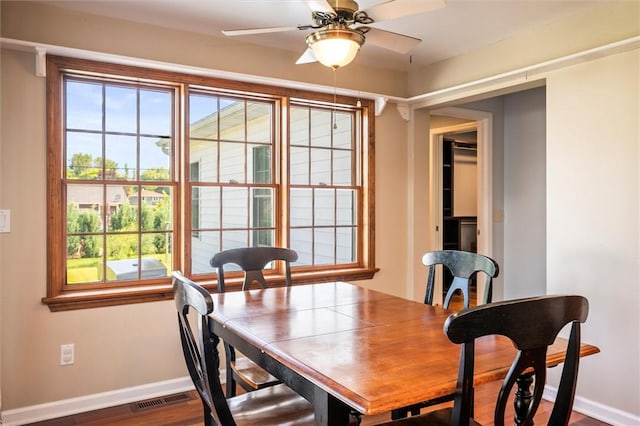 158 Pine Valley Dr, Greece, NY 14626 - dining area featuring ceiling fan and dark wood-type flooring