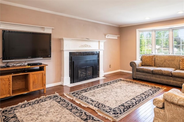 158 Pine Valley Dr, Greece, NY 14626 - living area featuring dark wood-style floors, crown molding, and a tiled fireplace
