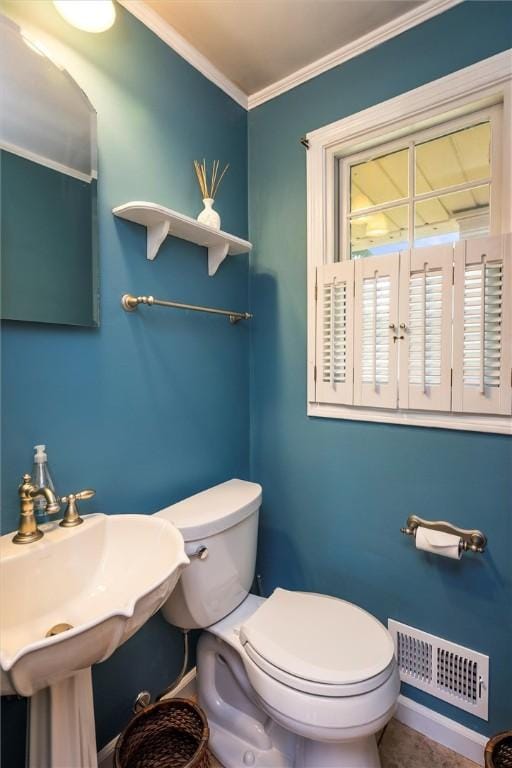 158 Pine Valley Dr, Greece, NY 14626 - bathroom featuring toilet and ornamental molding