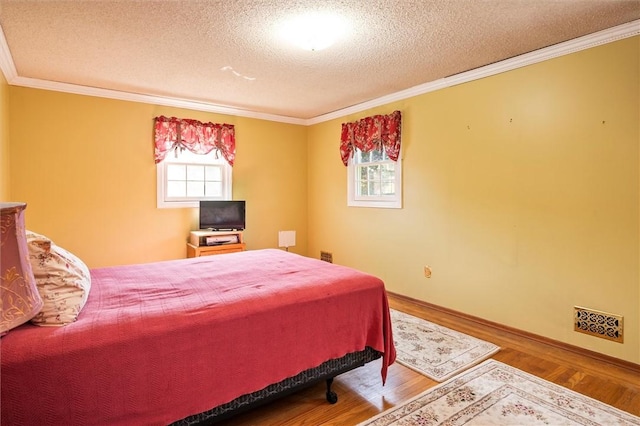 158 Pine Valley Dr, Greece, NY 14626 - bedroom with a textured ceiling, crown molding, and wood finished floors