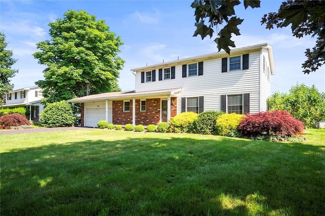 158 Pine Valley Dr, Greece, NY 14626 - view of front of house featuring an attached garage, a front lawn, asphalt driveway, and brick siding