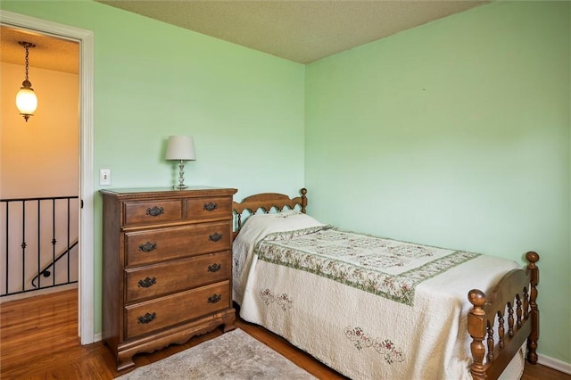 158 Pine Valley Dr, Greece, NY 14626 - bedroom featuring wood finished floors and baseboards