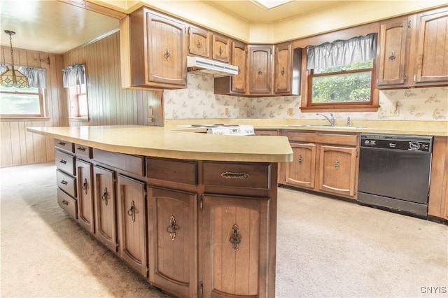 14309 Maple St, Diana, NY 13648 - kitchen with dishwasher, under cabinet range hood, light countertops, light colored carpet, and wallpapered walls