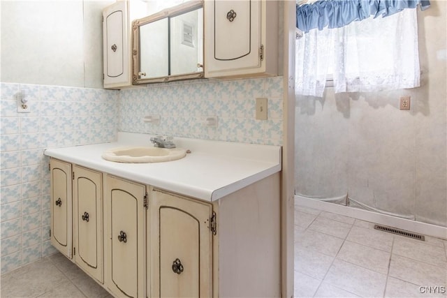 14309 Maple St, Diana, NY 13648 - bathroom featuring vanity and tile patterned floors