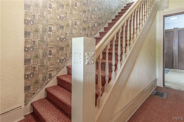 14309 Maple St, Diana, NY 13648 - stairs with carpet floors and a textured wall