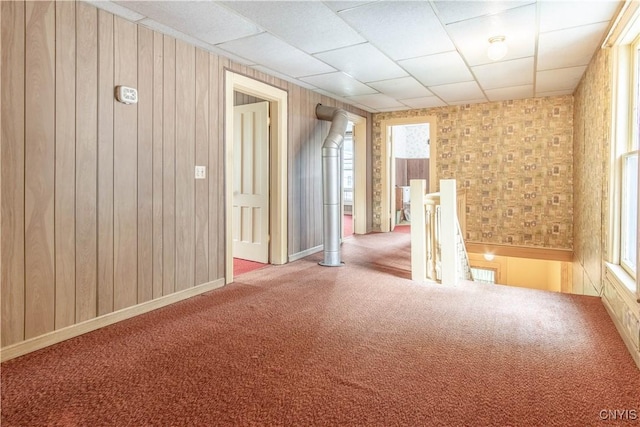 14309 Maple St, Diana, NY 13648 - carpeted spare room with plenty of natural light and wooden walls