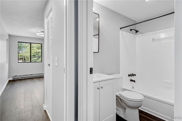 279 Watertree Dr, Dewitt, NY 13057 - bathroom featuring baseboard heating, vanity, shower / bath combination, and wood finished floors