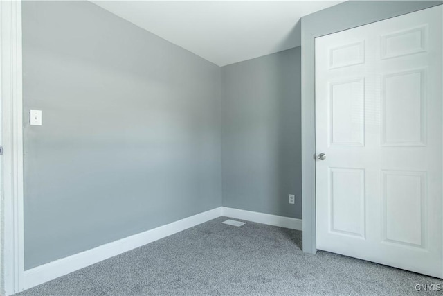 807 Bingham Ave, Watertown City, NY 13601 - spare room featuring carpet flooring and baseboards