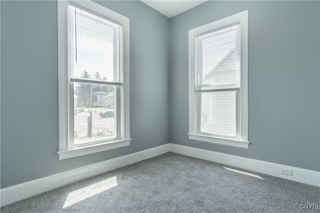 807 Bingham Ave, Watertown City, NY 13601 - carpeted spare room featuring baseboards