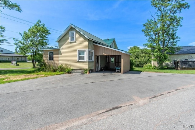 24679 Hinds Rd, Pamelia, NY 13601 - view of front of home with driveway and an attached carport