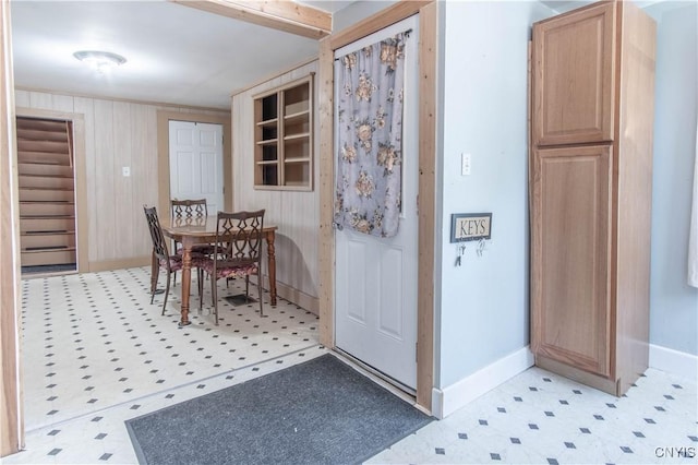24679 Hinds Rd, Pamelia, NY 13601 - dining room featuring light floors and wood walls
