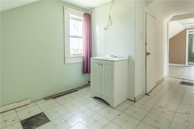 24679 Hinds Rd, Pamelia, NY 13601 - laundry room featuring light floors and a sink