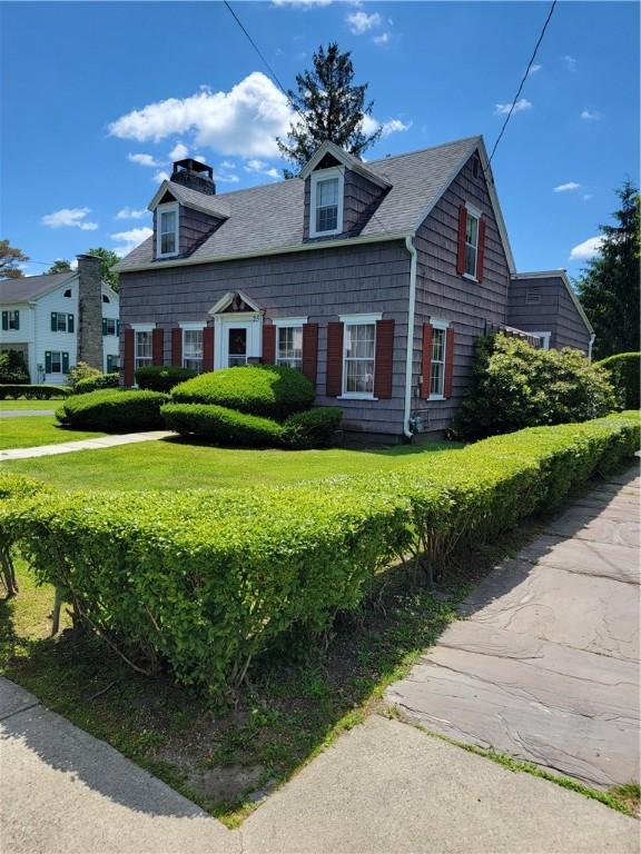 25 Francis Ave, Norwich, NY 13815 - view of front of house with a front yard and a shingled roof