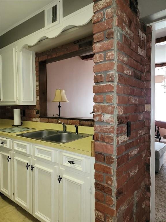 25 Francis Ave, Norwich, NY 13815 - detailed view of brick wall and crown molding