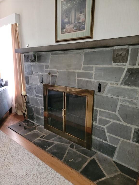 25 Francis Ave, Norwich, NY 13815 - detailed view of a fireplace and wood finished floors