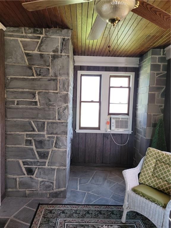 25 Francis Ave, Norwich, NY 13815 - bathroom with wood ceiling, stone tile flooring, and cooling unit