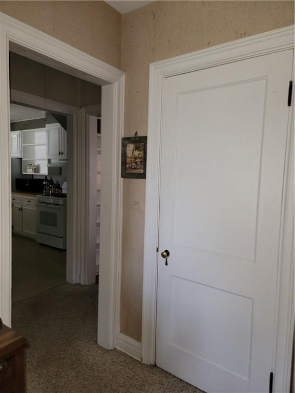 25 Francis Ave, Norwich, NY 13815 - hallway with carpet flooring