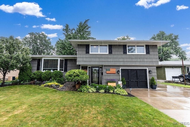 760 Westbrook Dr, North Tonawanda, NY 14120 - split level home featuring driveway, a front lawn, and a garage