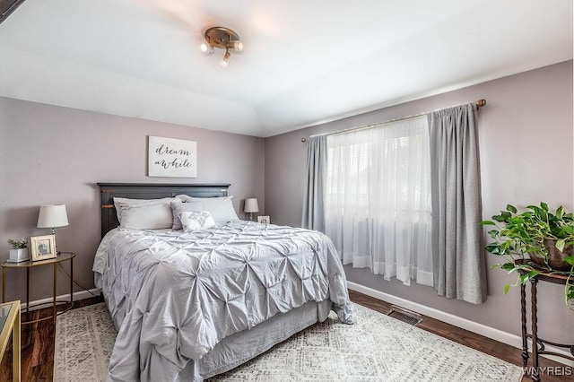 760 Westbrook Dr, North Tonawanda, NY 14120 - bedroom with wood finished floors and lofted ceiling