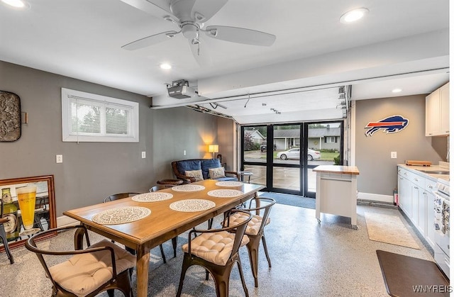 760 Westbrook Dr, North Tonawanda, NY 14120 - dining room featuring recessed lighting, dark aggregate flooring, and a ceiling fan