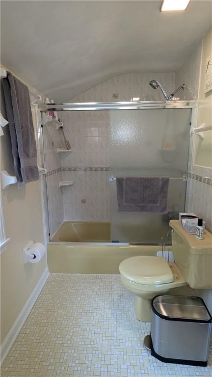 818 Tinker Tavern Rd, Webster, NY 14580 - bathroom featuring shower / bath combination, vaulted ceiling, and tile walls