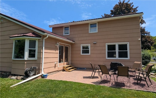 818 Tinker Tavern Rd, Webster, NY 14580 - rear view of property featuring a patio, entry steps, and a yard