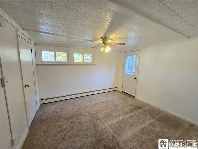 515 Newland Ave, Jamestown, NY 14701 - unfurnished room with a baseboard heating unit, a ceiling fan, carpet, and healthy amount of natural light