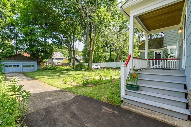 190 Laburnam Cres, Rochester, NY 14620 - view of green lawn featuring a porch, a detached garage, and an outbuilding